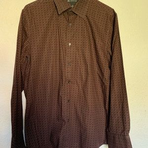 It’s black and purple dots,size medium cotton shirt